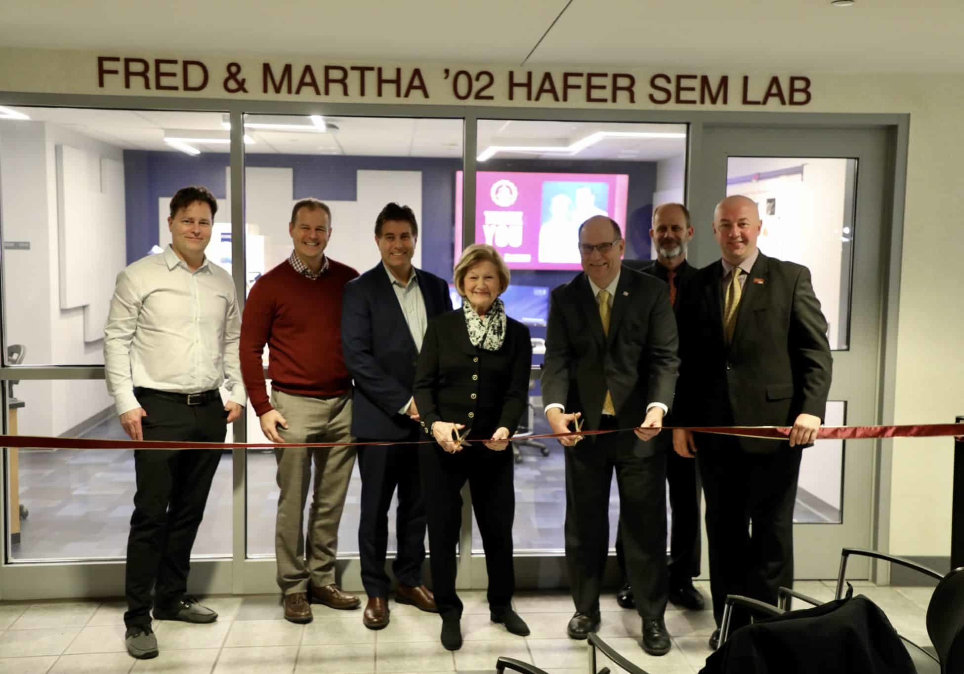 SEM Ribbon Cutting Kutztown University unveiled a new high-powered microscope,at Boehm Science Center, Saturday, Nov. 2, 2019. Officials with KU said the electron scanning microscope, and its new lab, will increase the quality of research available to students.The microscope is similar to the ones you may have used in high school - just a lot more powerful. It has the ability to help researchers date an object by showing its composition. It will be used by many departments including the geology, biology and art departments.The microscope was donated by Fred and Martha Hafer.